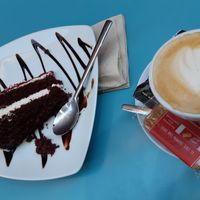 Red velvet cake and cortado at Freedom Cakes Bakery in Madrid