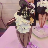 Chocolate Freakshake with Choco-Peanut Cake, Cream, crumbled Oreos and Cookies at Freedom Cakes Bakery in Madrid