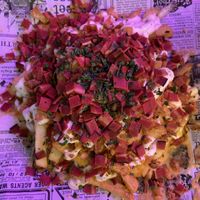 Fries + cheese + bacon  at Freedom Cakes Bakery in Madrid