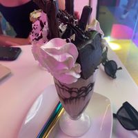 Death by Freakshake (Chocolate Milkshake with whipped cream, a piece of chocolate cake, and a chocolate-covered cookie on top) at Freedom Cakes Bakery in Madrid