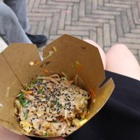rice noodles with turmeric tofu, rocket, mushrooms and peanut sauce at ilBruno  in Florence