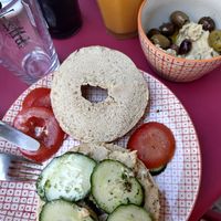 Vegan breakfast option, bagel with hummus at POP Der Kaffeeladen in Meersburg
