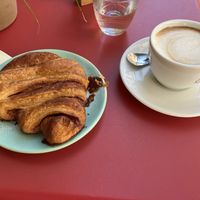 Franzbrötchen and oat milk flat white  at POP Der Kaffeeladen in Meersburg
