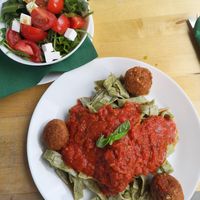 Spaghetti with balls and tomatosauce. Salad on the side at Simple Green in Zagreb