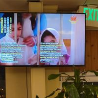 Religious TV at Loving Hut in Seattle