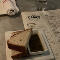 Bread with olive oil  at Campo Enoteca in Manchester