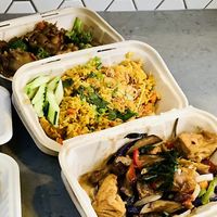 Eggplant dish, curry rice, pad see ew at Kati Vegan Thai in Seattle