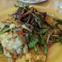 Pad keemao 18 
‘Drunken’ noodles stir fried with 
basil, bell peppers, onions, fried 
tofu, and portobello mushrooms. at Kati Vegan Thai in Seattle