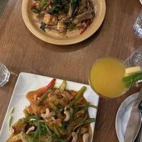 Pad keemao at the top and sweet and sour cashew on the bottom  at Kati Vegan Thai in Seattle