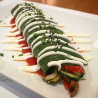 Spinach crepe with seitán and veggies with cheese sauce at Pistatxo in Murcia