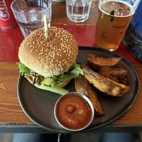 vegan burger with potato wedges  at Akureyri Backpackers in Akureyri