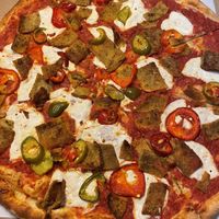 Vegan cheese, cherry peppers, and eggplant at GG's Wood Fired Pizza in Milford