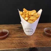 Medium fries with curry ketchup and sate sauce  at BeFries in Brighton