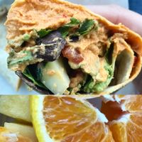 Hummus wrap and fruit cup at Fresh Vibes Juice Bar in Rock Hill