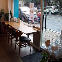Interior of location, view towards the entrance and some seating at Soiroum in Seoul