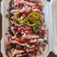 Loaded fries 🍟 I asked for no mustard & easy on the jalapeños at El Cocinero Restaurant in Van Nuys