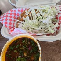 Tacos dorados (birria) with consume at El Cocinero Restaurant in Van Nuys