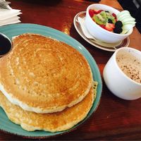 The vegan pancakes, season fruit bowl, and a hot chocolate!  at Bentley's House of Coffee & Tea in Tucson
