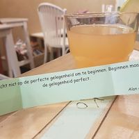 saying on paper with drinks at T&Ko in Leuven