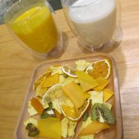 Soymilk drink and Pumpkin and coconut drink along with dried fruit plate. at Green Market in Xiamen