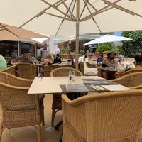 Outside terrace next to beach at Mirablau Beach Bar & Restaurant in Mallorca