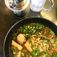 Vegan bun bo hue. Tasty noodle soup with laksa-style rice noodles, mock ham, meatballs and beef slices, in a tasty lemongrass-infused broth.  at Mimi Nguyen Cafe in Puchong
