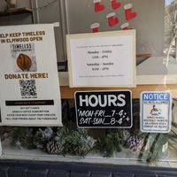 Window signs at Timeless Coffee Roasters and Bakery in Berkeley