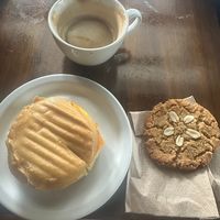vegan eleven sandwich, peanut butter sand dollar cookie and an empty latte mug at Cafe Eleven in Portland