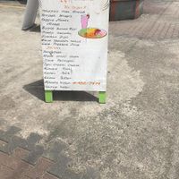 menu board outside at Three Angels Cafe in Castries City