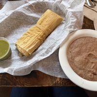 New World tamale and a side of beanss  at Spanglish in Traverse City