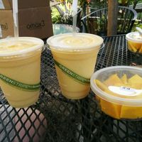 Smoothie no 4 and fresh cut mango. Bliss at The South Kona Fruit Stand in Captain Cook