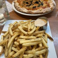 Vegan pizza and dill vinegar fries with vegan aioli. Super yummy!   at Deschutes Brewery & Public House in Bend
