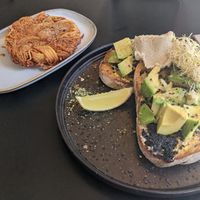 Avo on toast with a side of hashbrown at Grown in West End