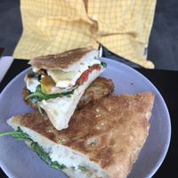 Toasted sandwich with hash brown  at Grown in West End