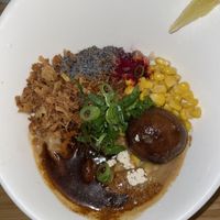 White garlic and red chili pepper Ramen (can’t see the noodles under the spices and sauce)   at Men Impossible in Amsterdam