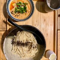 Dipping noodles with a creamy sauce at Men Impossible in Amsterdam