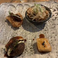 Warm starters: seitan, 2 types of noodles, takoyaki and potato mochi. Very good! at Men Impossible in Amsterdam