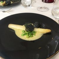 White asparagus with beurre blanc and charcoal tuile.   at Gauthier Soho in London