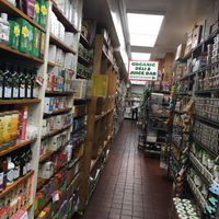 Cramped but full aisles of store at The Health Nuts Deli - East Side Midtown in New York City