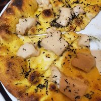 This was the cheese garlic bread. Same weird"cheese" was on the pizza. Didn't melt, strange texture, no idea what it actually was. at Black Isle Bar and Rooms in Inverness