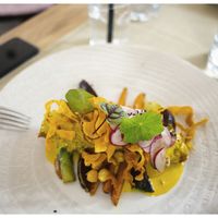 "Crazy Chickpea" House made Seitan with Checkpea, turmeric salsa and fresh veggies. at Gaudi&Naan in Ljubljana