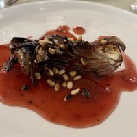 Chicory, kombucha reduction, pine nuts   at Gaudi&Naan in Ljubljana