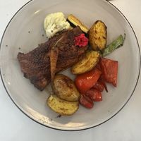 Juice marble ribs - very good! Veg was bland though and needed a sauce of some kind!   at Gaudi&Naan in Ljubljana