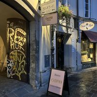 Look for the signs, because the restaurant is a little bit hidden in a yard.  at Gaudi&Naan in Ljubljana