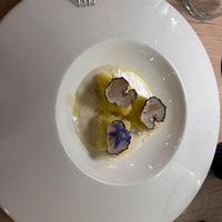 Homemade butternut squash gnocchi in a seriously good cheesy sauce and truffle at Gaudi&Naan in Ljubljana