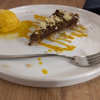 Chocolate tart with mango ice cream at Gaudi&Naan in Ljubljana