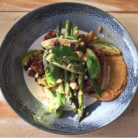 Beetroot and Caraway loaf (vegan) with asparagus and brussel sprouts  at Local Press Cafe in Canberra