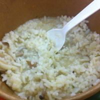 Green curry with rice in small take out container... good but REALLY REALLY SMALL :-( at ROM Vegetarian Restaurant in Da Nang