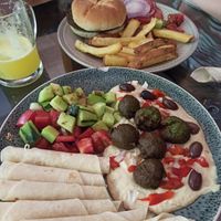 Falafel plate, vegan burgers plus added on chips at Salvador's in Kunming