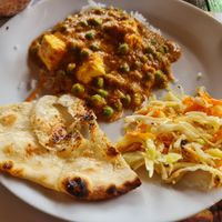 Mattar panner, rice pualuo, garlic naan, exotic salad at Diwali Mahal in Belgrade